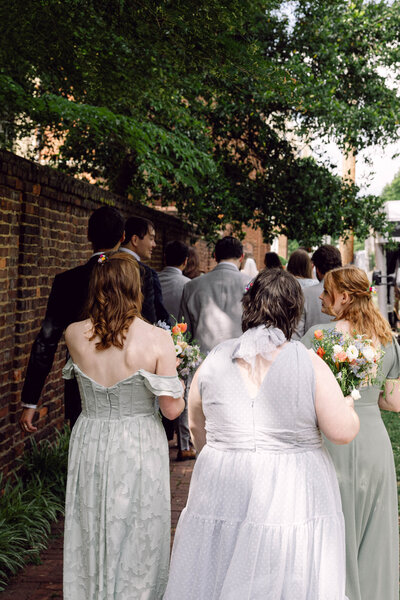 Bride and groom embracing lovingly during their New York City wedding.
