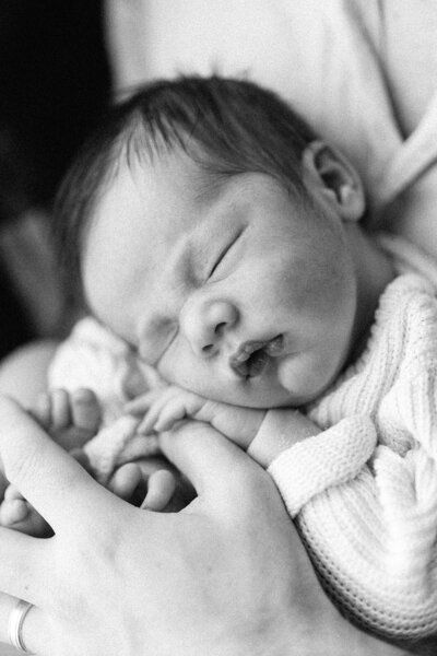 baby lying down with siblings