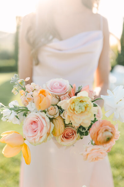 bridesmaid holds bouquet at Viansa Winery Amy Jordan Photography