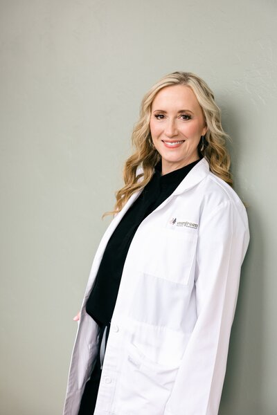 Professional branding headshot of a doctor in their workplace.