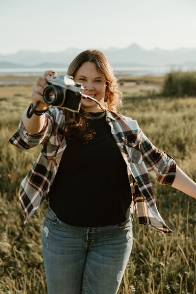 woman kissing infant