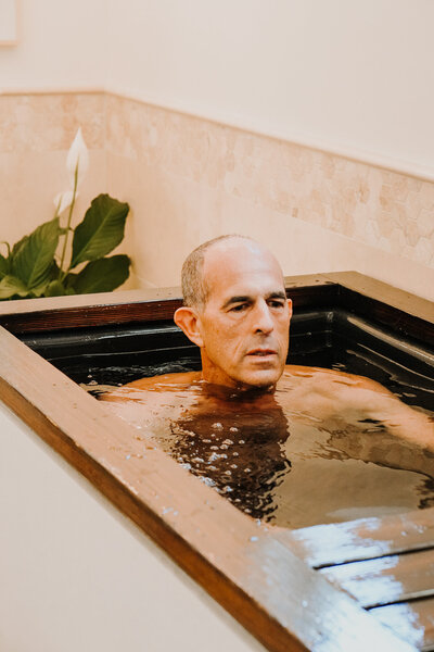 Man in a tub in a spa