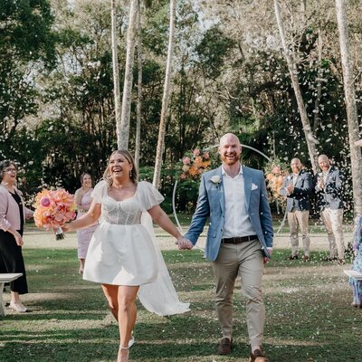 Gold Coast couple at their wedding, blonde soft waves and soft glam makeup