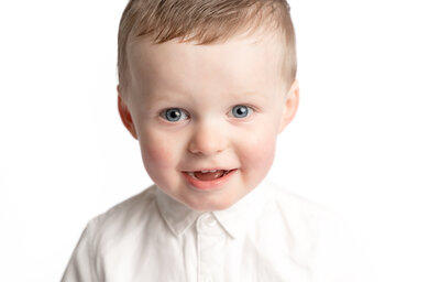 little boy with white shirt on