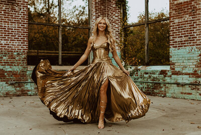 highschool senior in gold dress