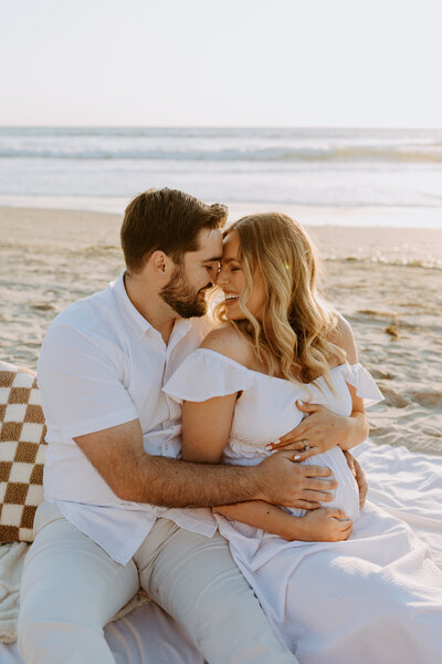 Natural Candid Documentary Family Maternity Baby Pregnancy Announcement Photo shoot at La Jolla Windansea beach at sunset - Couples Mom and Dad San Diego Maternity Photographer