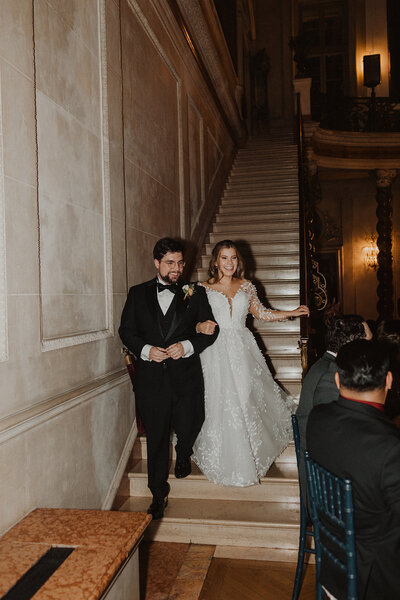 Bride and Groom embrace in front of Anderson House wedding venue in DC