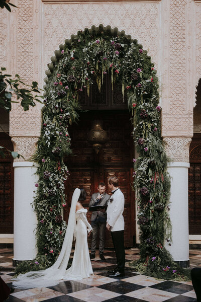 Bride and Groom under Grennery Arch