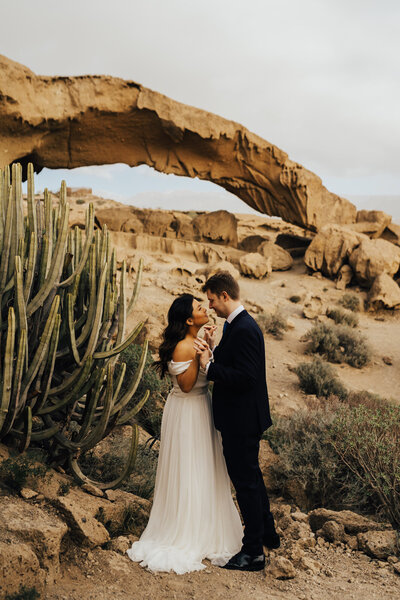 bride and groom dancing and having their first dance outside doing a hollywood dip