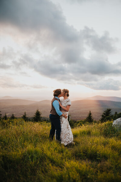 bride holding groom's cheek