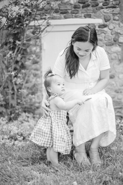 A black and white motherhood photography image from Emi Rose's Rochester NY family and motherhood sessions.