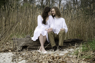 Romantic engagement session at Greenwell State Park Maryland - couple embracing during golden hour portrait photography
