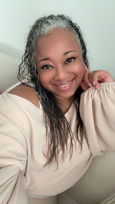 Editorial-style portrait of Letitia Hopkins, Main Character Energy coach, with a confident and empowering expression.