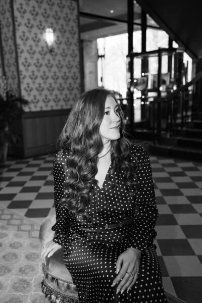 Nicole Hart sitting during personal brand photoshoot