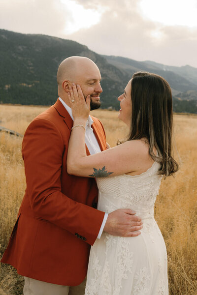 couple in rocky mountain NP enjoying their time together 