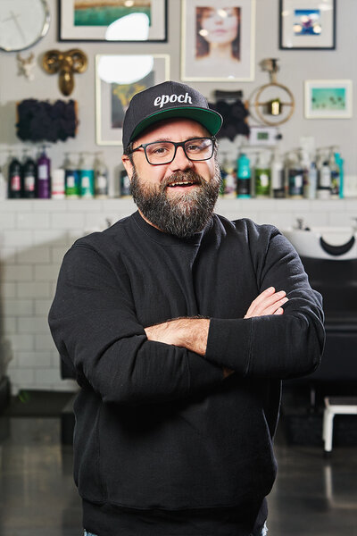 Headshot of Epoch Studio Salon's co-owner and brand manager, Ben Mahoney