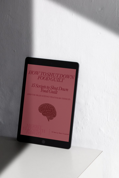 Merrit texting on phone to client