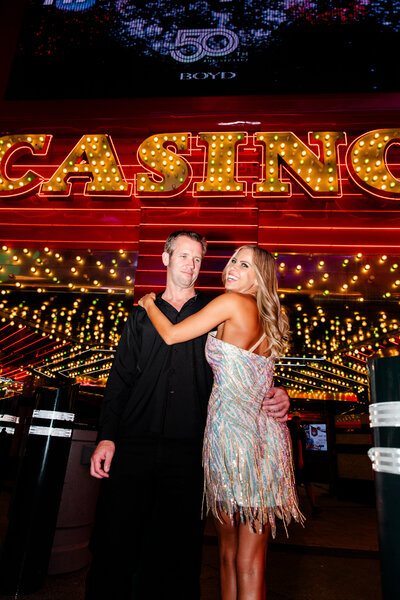 This Las Vegas engagement session was on Fremont Street and sported a glitzy, opal sequin dress