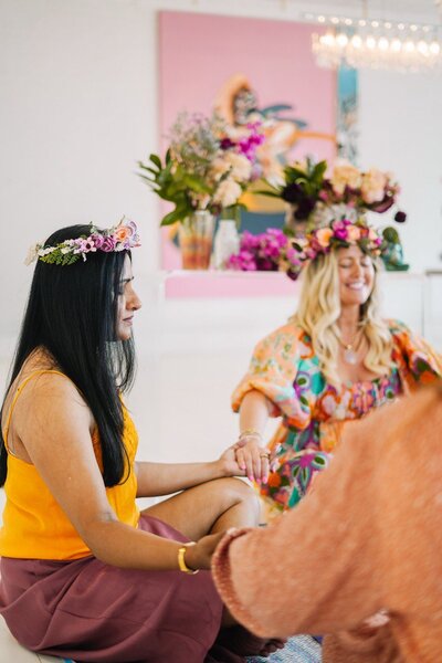 Women in a workshop session, resonating deeply with their body, mind, soul, and higher spiritual self.