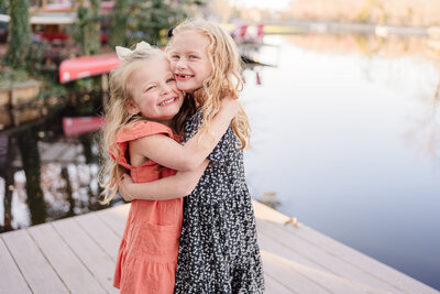 philadelphia family photographer standard photo session sisters hugging