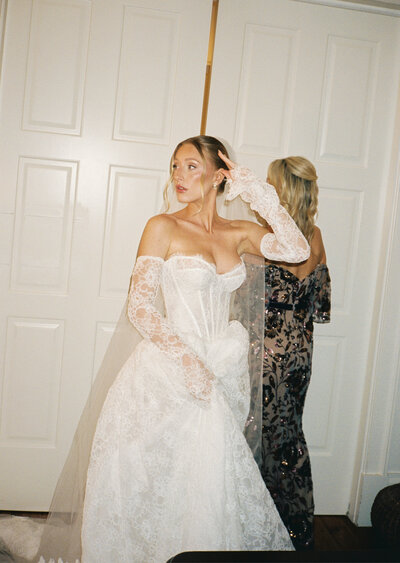 A film photo of a bride getting ready 