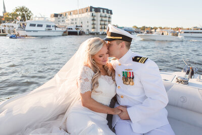 Annapolis Naval Academy wedding photo of couple on boat in Ego Alley by Maryland photographer, Christa Rae Photography