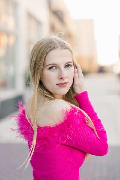 portrait of a girl in a hot pink dress