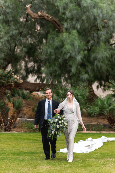 Newly married couple at their Oasis at Death Valley outdoor wedding
