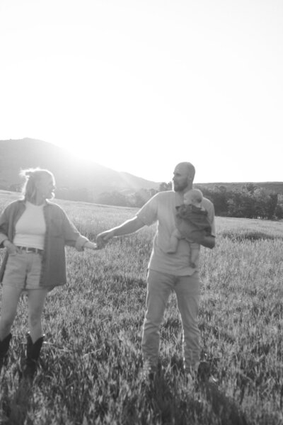 Super 8 Videographer with family in a field