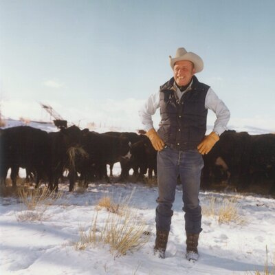 Ol Jim cowboy in front of cows
