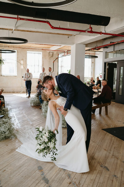 Modern Remai Rooftop wedding photos of new bride and groom