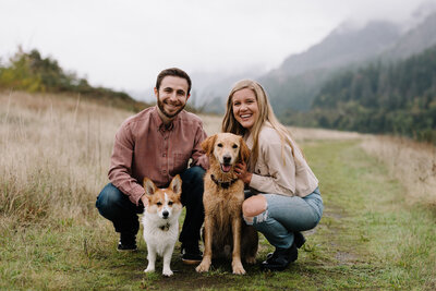 family photo of couple with their dogs in the columbia gorge