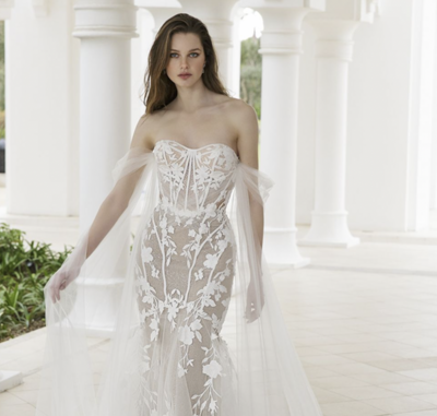 Blue by Enzoani stock photo of model bride in a fitted lace wedding dress.
