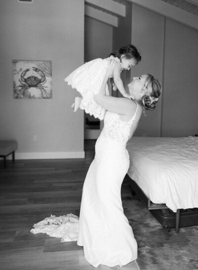 Kelly shares a heartwarming moment with her daughter before the wedding at La Siesta Marina Resort.