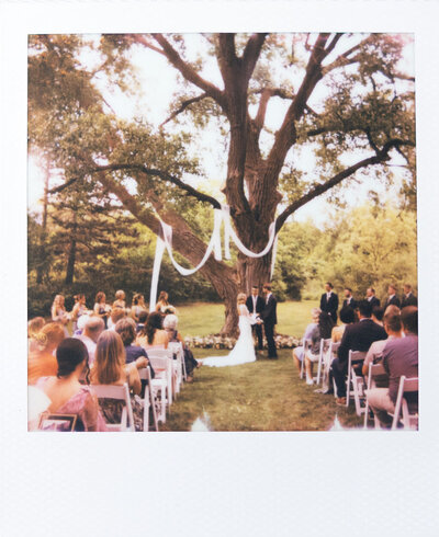 newly engaged couple polaroid