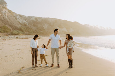 Beach candid natural fun family photo shoot with kids, christmas holiday card photo shoot, San Diego portraits photographer, young families, multigenerational with grandma
