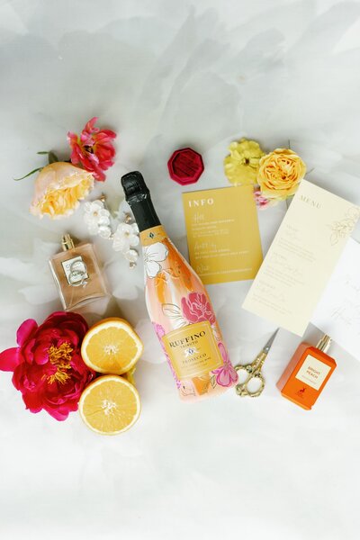 Flatlay with champagne and citrus