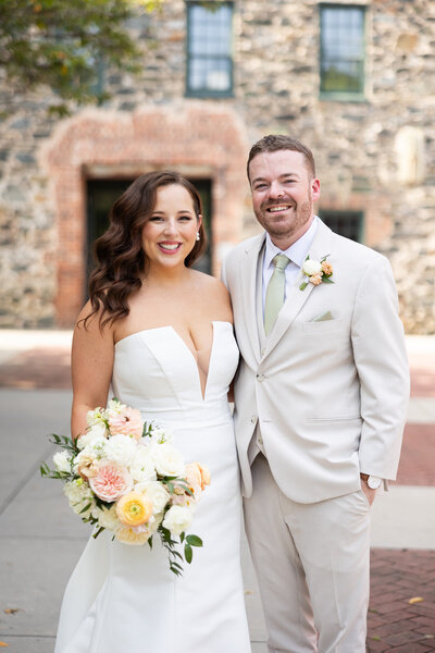Bride with long, flowing Hollywood waves paired with soft, natural makeup — modern glam by Klover Beauty in Maryland.