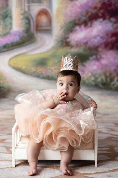 6 month old girl in pink dream dress during fine art session near San Antonio