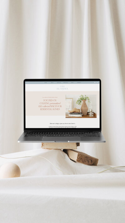 Casa Del Marmol website open on a laptop