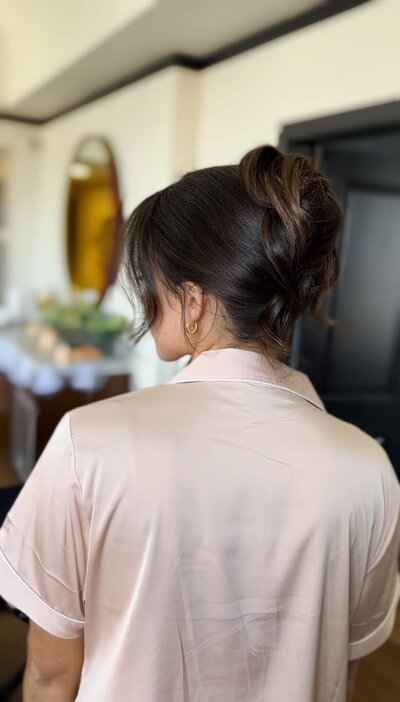 Polished high updo for bride seeking a clean and refined look — bridal hairstyling by Klover Beauty in Maryland.