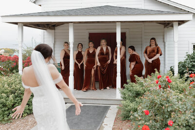 A newlywed doing a first look with their wedding party 
