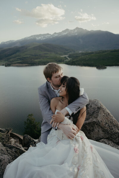 A sweet couple elopes in the mountains of Colorado and sunset.