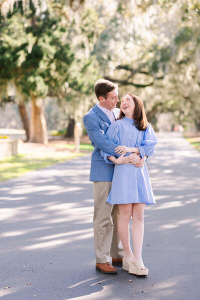 Golden Hour Engagement session of an excited and loving couple at Caledonia Wedding Venue in Myrtle Beach, South Carolina