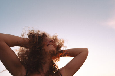 woman holding hair