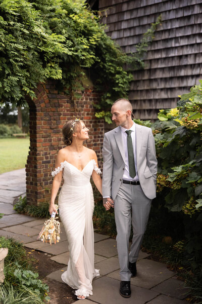Bride and groom smiling at each other