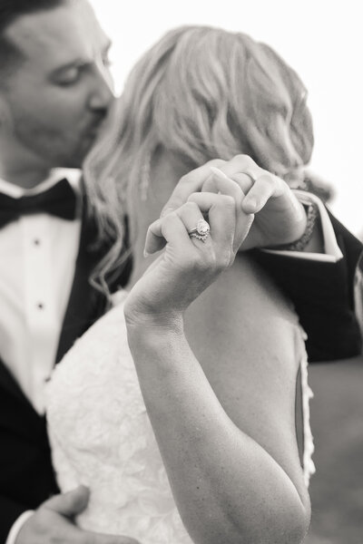 Bride and groom ring detail photo