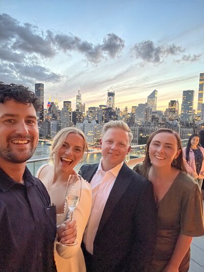 Amy & Nick posing with couple