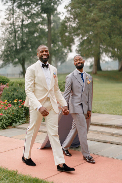 bride and groom posing during sunset