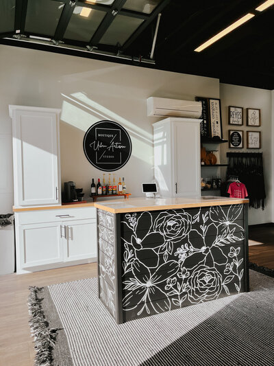 Custom mural in a small business representing branding design offerings by Life in Letters.